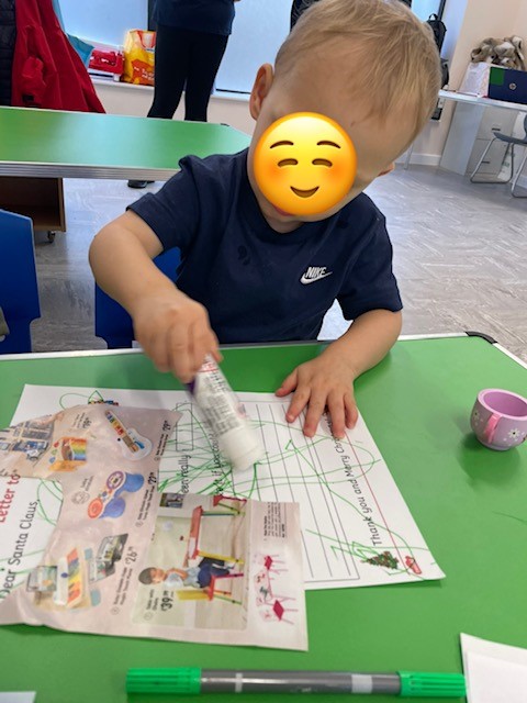 child engaged in play at Garston nursery school